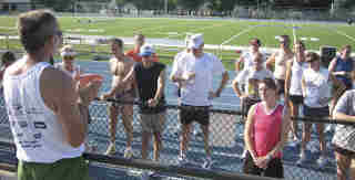 Pep talk at the track.